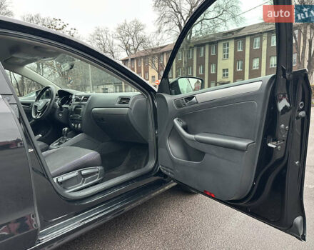 Черный Фольксваген Джетта, объемом двигателя 1.4 л и пробегом 175 тыс. км за 8999 $, фото 19 на Automoto.ua