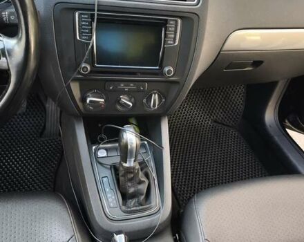 Черный Фольксваген Джетта, объемом двигателя 1.4 л и пробегом 89 тыс. км за 11400 $, фото 5 на Automoto.ua