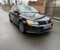 Черный Фольксваген Джетта, объемом двигателя 1.4 л и пробегом 160 тыс. км за 11990 $, фото 2 на Automoto.ua