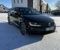 Черный Фольксваген Джетта, объемом двигателя 1.4 л и пробегом 186 тыс. км за 11300 $, фото 1 на Automoto.ua