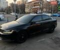 Черный Фольксваген Джетта, объемом двигателя 1.39 л и пробегом 164 тыс. км за 10500 $, фото 1 на Automoto.ua