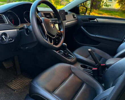 Черный Фольксваген Джетта, объемом двигателя 1.4 л и пробегом 126 тыс. км за 10500 $, фото 4 на Automoto.ua