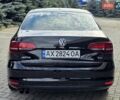 Черный Фольксваген Джетта, объемом двигателя 1.4 л и пробегом 126 тыс. км за 8900 $, фото 7 на Automoto.ua