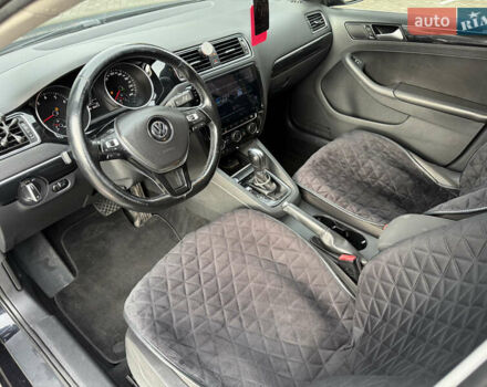 Черный Фольксваген Джетта, объемом двигателя 1.4 л и пробегом 151 тыс. км за 11000 $, фото 26 на Automoto.ua