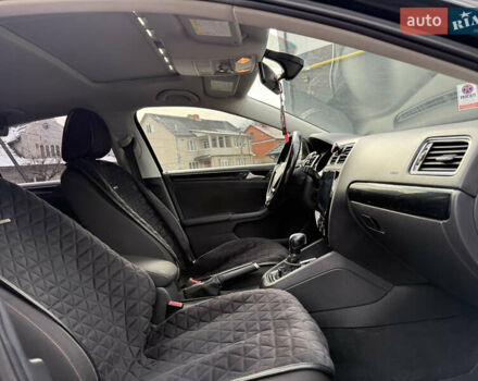 Черный Фольксваген Джетта, объемом двигателя 1.4 л и пробегом 151 тыс. км за 11000 $, фото 40 на Automoto.ua