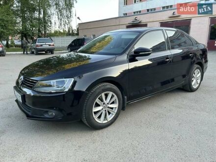 Фольксваген Джетта 2013 у Хмельницькому на Automoto.ua Чорний Фольксваген Джетта, об'ємом двигуна 1.4 л та пробігом 124 тис. км за 10500 $, фото 1 на Automoto.ua
