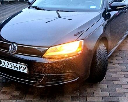 Чорний Фольксваген Джетта, об'ємом двигуна 1.4 л та пробігом 241 тис. км за 8599 $, фото 1 на Automoto.ua