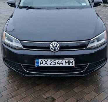 Чорний Фольксваген Джетта, об'ємом двигуна 1.4 л та пробігом 241 тис. км за 8599 $, фото 1 на Automoto.ua