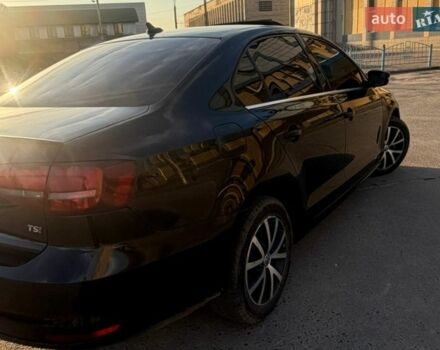 Черный Фольксваген Джетта, объемом двигателя 1.4 л и пробегом 150 тыс. км за 11000 $, фото 1 на Automoto.ua