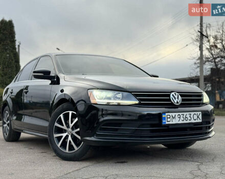 Черный Фольксваген Джетта, объемом двигателя 1.4 л и пробегом 80 тыс. км за 12200 $, фото 1 на Automoto.ua