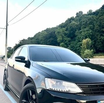 Черный Фольксваген Джетта, объемом двигателя 1.8 л и пробегом 110 тыс. км за 12000 $, фото 1 на Automoto.ua