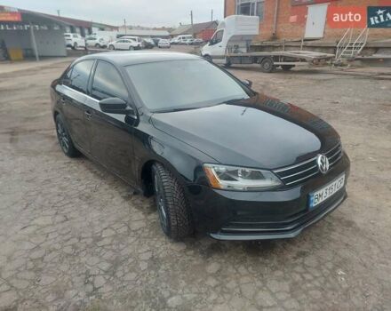 Черный Фольксваген Джетта, объемом двигателя 1.4 л и пробегом 102 тыс. км за 11700 $, фото 1 на Automoto.ua