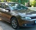 Фольксваген Джетта 2013 в Белой Церкве на Automoto.ua Коричневый Фольксваген Джетта, объемом двигателя 2 л и пробегом 270 тыс. км за 8700 $, фото 1 на Automoto.ua