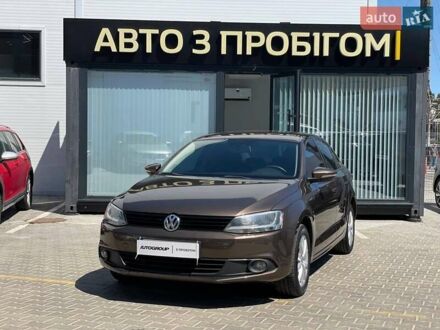 Коричневый Фольксваген Джетта, объемом двигателя 1.39 л и пробегом 126 тыс. км за 9300 $, фото 1 на Automoto.ua
