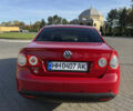 Красный Фольксваген Джетта, объемом двигателя 1.6 л и пробегом 125 тыс. км за 6000 $, фото 7 на Automoto.ua