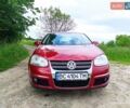 Красный Фольксваген Джетта, объемом двигателя 1.6 л и пробегом 225 тыс. км за 5600 $, фото 1 на Automoto.ua