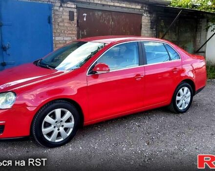 Красный Фольксваген Джетта, объемом двигателя 1.4 л и пробегом 198 тыс. км за 6000 $, фото 1 на Automoto.ua