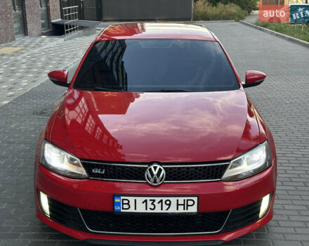 Фольксваген Джетта 2013 в Полтаве на Automoto.ua Красный Фольксваген Джетта, объемом двигателя 1.98 л и пробегом 190 тыс. км за 9200 $, фото 2 на Automoto.ua