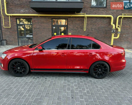 Фольксваген Джетта 2013 в Полтаве на Automoto.ua Красный Фольксваген Джетта, объемом двигателя 1.98 л и пробегом 190 тыс. км за 9200 $, фото 13 на Automoto.ua