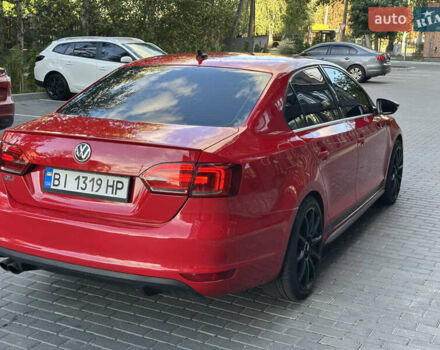 Фольксваген Джетта 2013 в Полтаве на Automoto.ua Красный Фольксваген Джетта, объемом двигателя 1.98 л и пробегом 190 тыс. км за 9200 $, фото 5 на Automoto.ua
