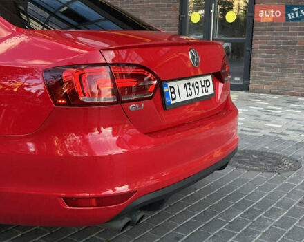 Фольксваген Джетта 2013 в Полтаве на Automoto.ua Красный Фольксваген Джетта, объемом двигателя 1.98 л и пробегом 190 тыс. км за 9200 $, фото 10 на Automoto.ua