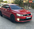Фольксваген Джетта 2013 в Полтаве на Automoto.ua Красный Фольксваген Джетта, объемом двигателя 1.98 л и пробегом 190 тыс. км за 9200 $, фото 3 на Automoto.ua