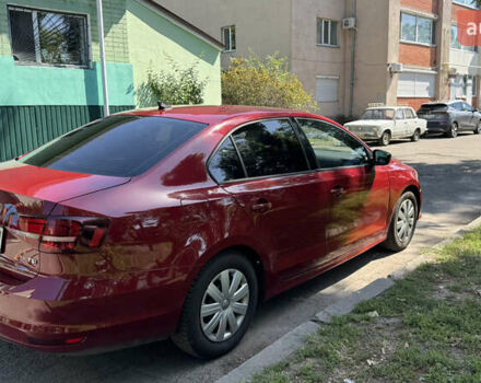 Красный Фольксваген Джетта, объемом двигателя 1.4 л и пробегом 158 тыс. км за 12250 $, фото 5 на Automoto.ua