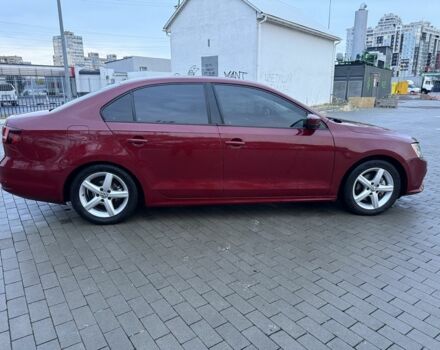 Красный Фольксваген Джетта, объемом двигателя 1.4 л и пробегом 53 тыс. км за 8999 $, фото 5 на Automoto.ua