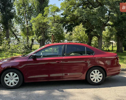 Красный Фольксваген Джетта, объемом двигателя 1.4 л и пробегом 158 тыс. км за 12250 $, фото 2 на Automoto.ua