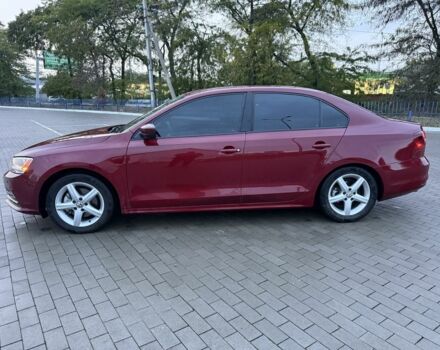 Красный Фольксваген Джетта, объемом двигателя 1.4 л и пробегом 53 тыс. км за 8999 $, фото 1 на Automoto.ua