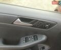 Красный Фольксваген Джетта, объемом двигателя 1.4 л и пробегом 112 тыс. км за 8950 $, фото 23 на Automoto.ua