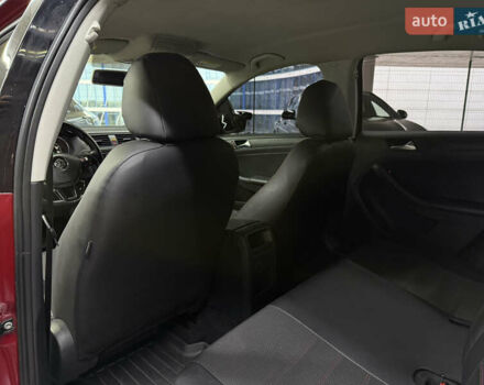Червоний Фольксваген Джетта, об'ємом двигуна 1.39 л та пробігом 209 тис. км за 9900 $, фото 22 на Automoto.ua