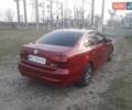 Красный Фольксваген Джетта, объемом двигателя 1.4 л и пробегом 112 тыс. км за 8950 $, фото 5 на Automoto.ua