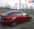 Червоний Фольксваген Джетта, об'ємом двигуна 1.4 л та пробігом 112 тис. км за 9299 $, фото 6 на Automoto.ua
