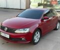 Червоний Фольксваген Джетта, об'ємом двигуна 1.39 л та пробігом 125 тис. км за 9599 $, фото 1 на Automoto.ua