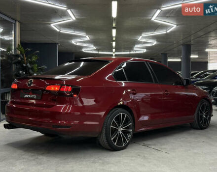 Червоний Фольксваген Джетта, об'ємом двигуна 1.39 л та пробігом 209 тис. км за 9900 $, фото 15 на Automoto.ua