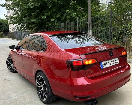 Красный Фольксваген Джетта, объемом двигателя 1.4 л и пробегом 125 тыс. км за 9800 $, фото 2 на Automoto.ua