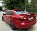 Красный Фольксваген Джетта, объемом двигателя 1.4 л и пробегом 125 тыс. км за 9800 $, фото 2 на Automoto.ua