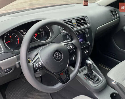 Червоний Фольксваген Джетта, об'ємом двигуна 1.4 л та пробігом 74 тис. км за 11499 $, фото 15 на Automoto.ua