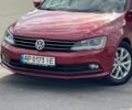 Красный Фольксваген Джетта, объемом двигателя 1.4 л и пробегом 107 тыс. км за 9999 $, фото 1 на Automoto.ua