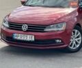 Красный Фольксваген Джетта, объемом двигателя 1.39 л и пробегом 107 тыс. км за 9999 $, фото 1 на Automoto.ua
