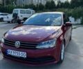 Красный Фольксваген Джетта, объемом двигателя 1.4 л и пробегом 105 тыс. км за 10450 $, фото 1 на Automoto.ua