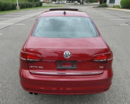 Красный Фольксваген Джетта, объемом двигателя 1.8 л и пробегом 54 тыс. км за 5300 $, фото 5 на Automoto.ua
