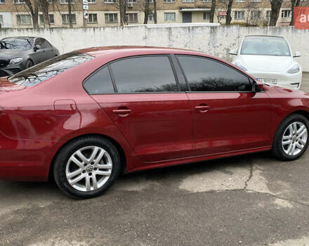 Червоний Фольксваген Джетта, об'ємом двигуна 1.4 л та пробігом 74 тис. км за 11499 $, фото 4 на Automoto.ua