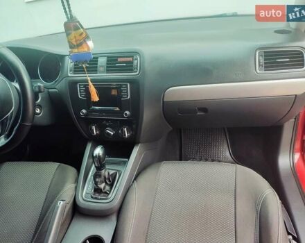 Червоний Фольксваген Джетта, об'ємом двигуна 1.4 л та пробігом 98 тис. км за 11300 $, фото 7 на Automoto.ua