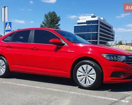 Красный Фольксваген Джетта, объемом двигателя 1.4 л и пробегом 101 тыс. км за 15599 $, фото 1 на Automoto.ua