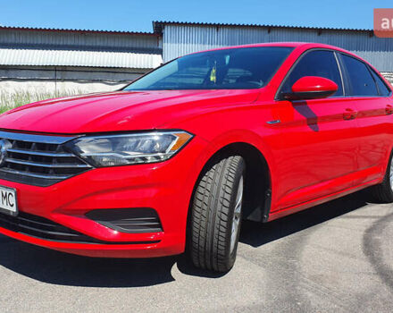 Красный Фольксваген Джетта, объемом двигателя 1.4 л и пробегом 101 тыс. км за 15599 $, фото 2 на Automoto.ua