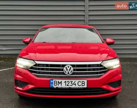 Красный Фольксваген Джетта, объемом двигателя 1.4 л и пробегом 84 тыс. км за 14000 $, фото 5 на Automoto.ua