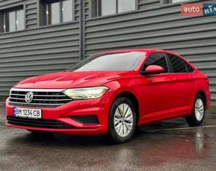 Красный Фольксваген Джетта, объемом двигателя 1.4 л и пробегом 84 тыс. км за 14000 $, фото 2 на Automoto.ua