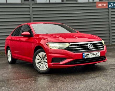 Красный Фольксваген Джетта, объемом двигателя 1.4 л и пробегом 84 тыс. км за 14000 $, фото 1 на Automoto.ua